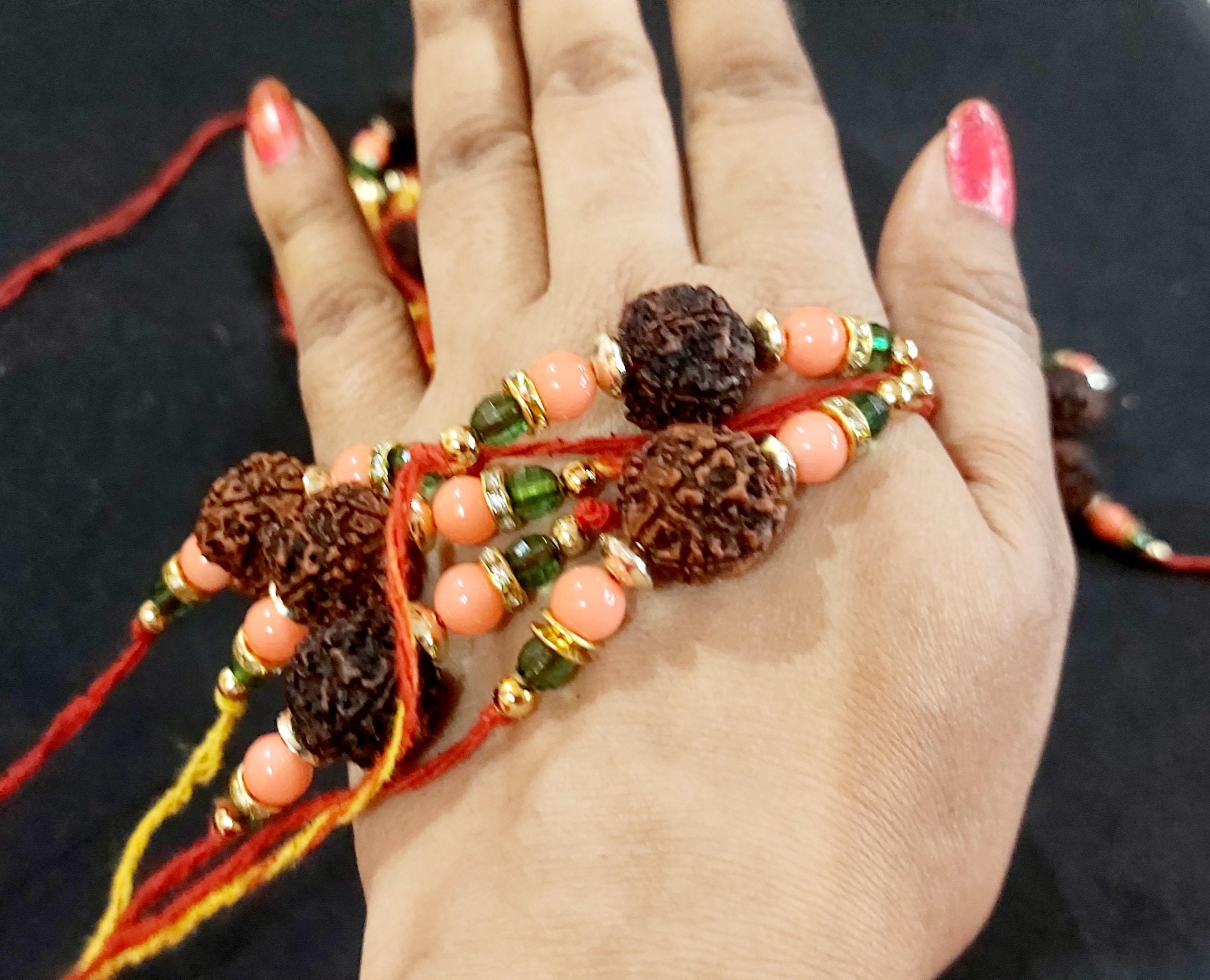 Designer Rakhi - Fabric, Metal | 2x2x1 Inches, Red Color, Basket Style, Attractive Packaging, Auspicious Symbol, Unique Style, Elegant Design