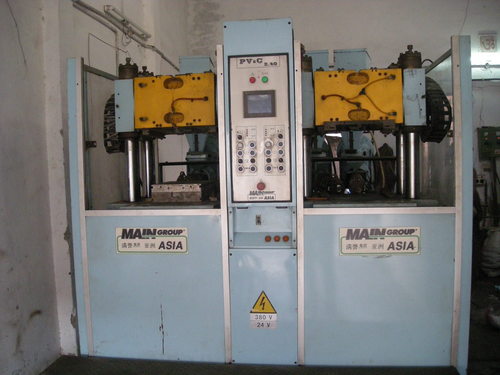 White & Blue Industrial Footwear Machines