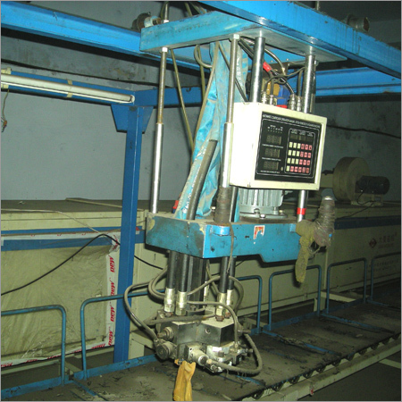 Blue & White Shoe Wrapper Machine