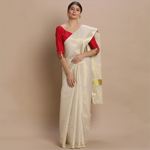 ऑफ व्हाइट केरला कसावु सारेस गोल्ड ज़री टिश्यू साड़ी टिशू बॉर्डर के साथ