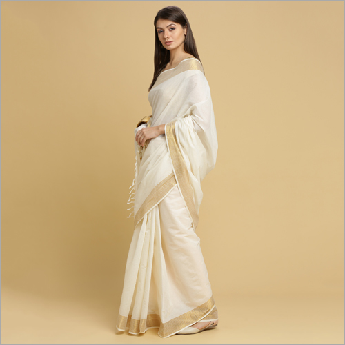 Off White Kerala Kasavu Plain Saree With Plain Body And Gold Silver Zari Border And Pallu
