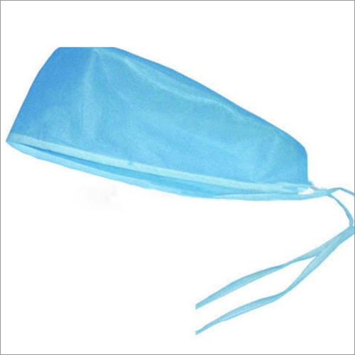 Non Woven Disposable Surgeon Cap - Non Woven Material, Universal Size, Blue Color | Equipment Type: Non Woven Disposable Cap, Condition: New, Use: Hospitals