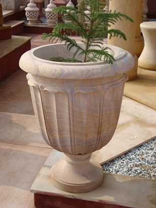 रेत पत्थर का सांप पौधा लगाने वाला