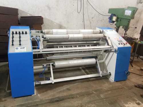 Automatic Stretch Film Slitter Rewinder - 4ftx8ftx4ft Dimensions, White & Light Blue Color | Pneumatic Arrangement, 10 Microns To 60 Microns Thickness, 3-year Warranty