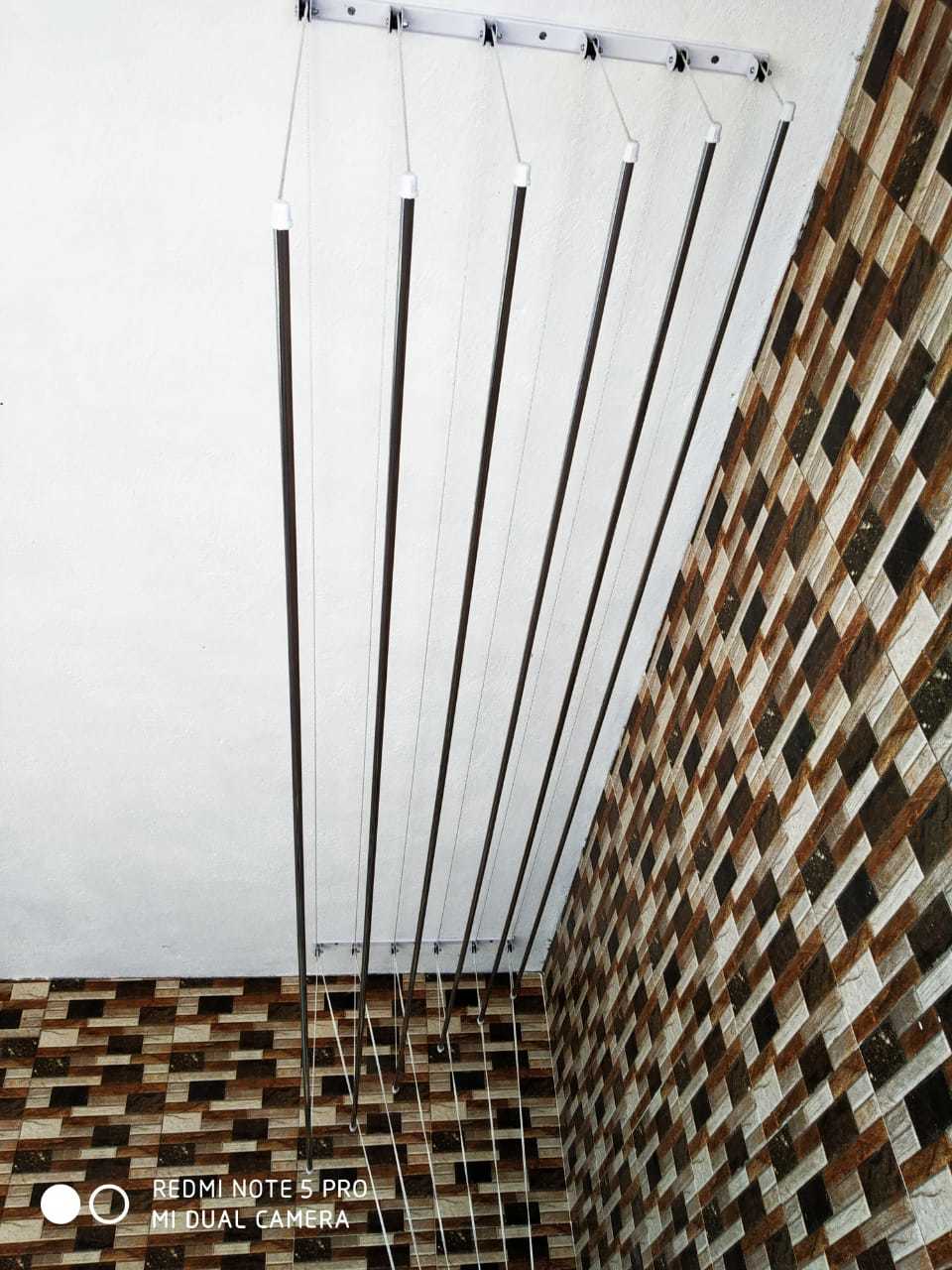 Shrijith Ceiling Pulley Cloth Drying Hanger - Stainless Steel, 4-8 Feet Height, Silver Color, Up To 45 Kg Capacity, Maintenance Free, Adjustable Lines