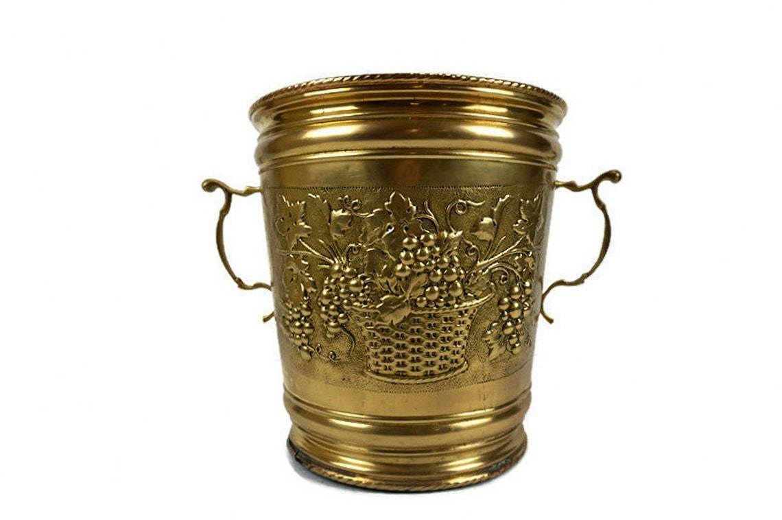 Brass Hammered Planterwith Lion Faced And Copper Elephant Engraved