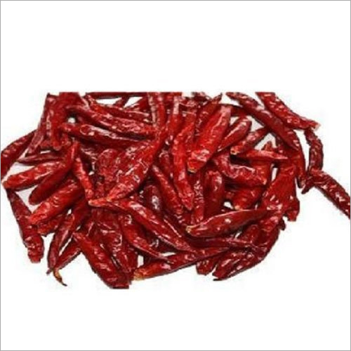 Guntur Dry Red Chilli - Raw Solid Edible Chilli, Hot & Spicy Flavor, Bright Red Color, Store in a Dry Place