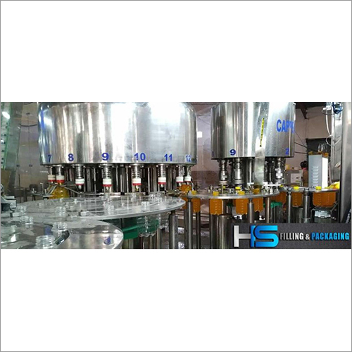 Industrial Juice Filling Machine - Metal, Silver | High Performance, ECO Friendly, Low Noise, Automatic with Human Machine Interface