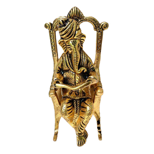 भगवान गणेश रामायण पढ़ते हुए