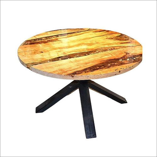 पॉलिश की हुई लकड़ी की गोल मेज
