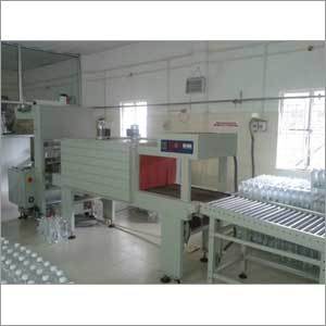 Semi-Automatic Shrink Wrapping Machine Capacity: 20 - 40 Bpm