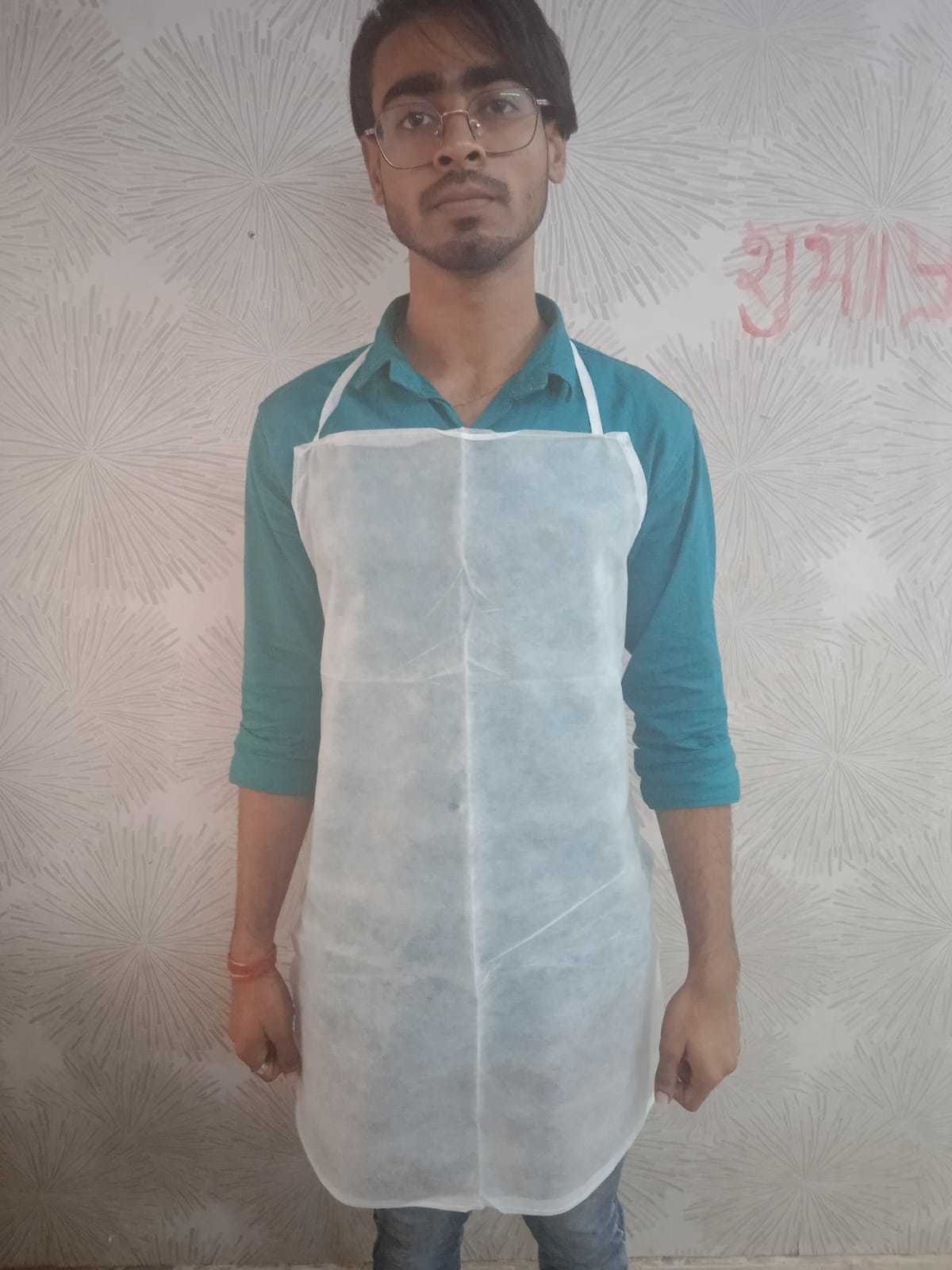 Non Woven Fabric Disposable Apron - Large Size, White Color | Lightweight, Smooth & Skin-friendly For Food Handling, Bakeries & Hair Styling