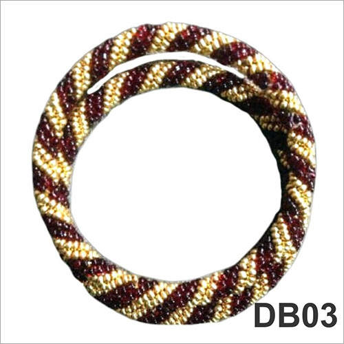 फैशन मारून गोल्डन फैंसी चूड़ियां