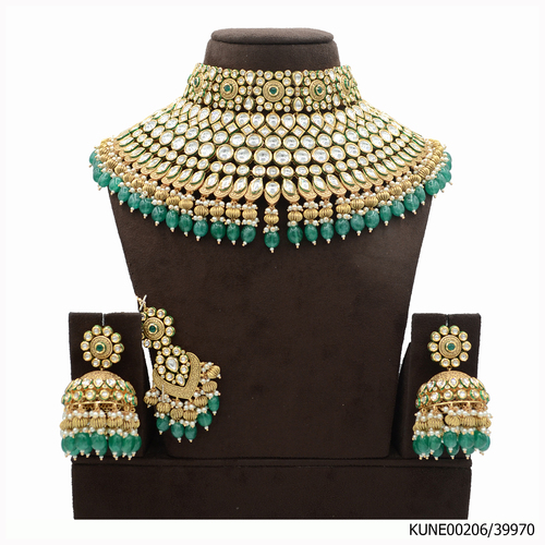 Kundan Semi Bridal Necklace Set With Maang Tikka And Green Meena Kari Work