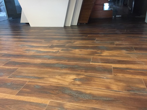 Laminated Wooden Flooring - Premium Quality Wood, Natural Color Finish | Moisture Resistant, Heat Resistant, Suitable for Residential & Commercial Use