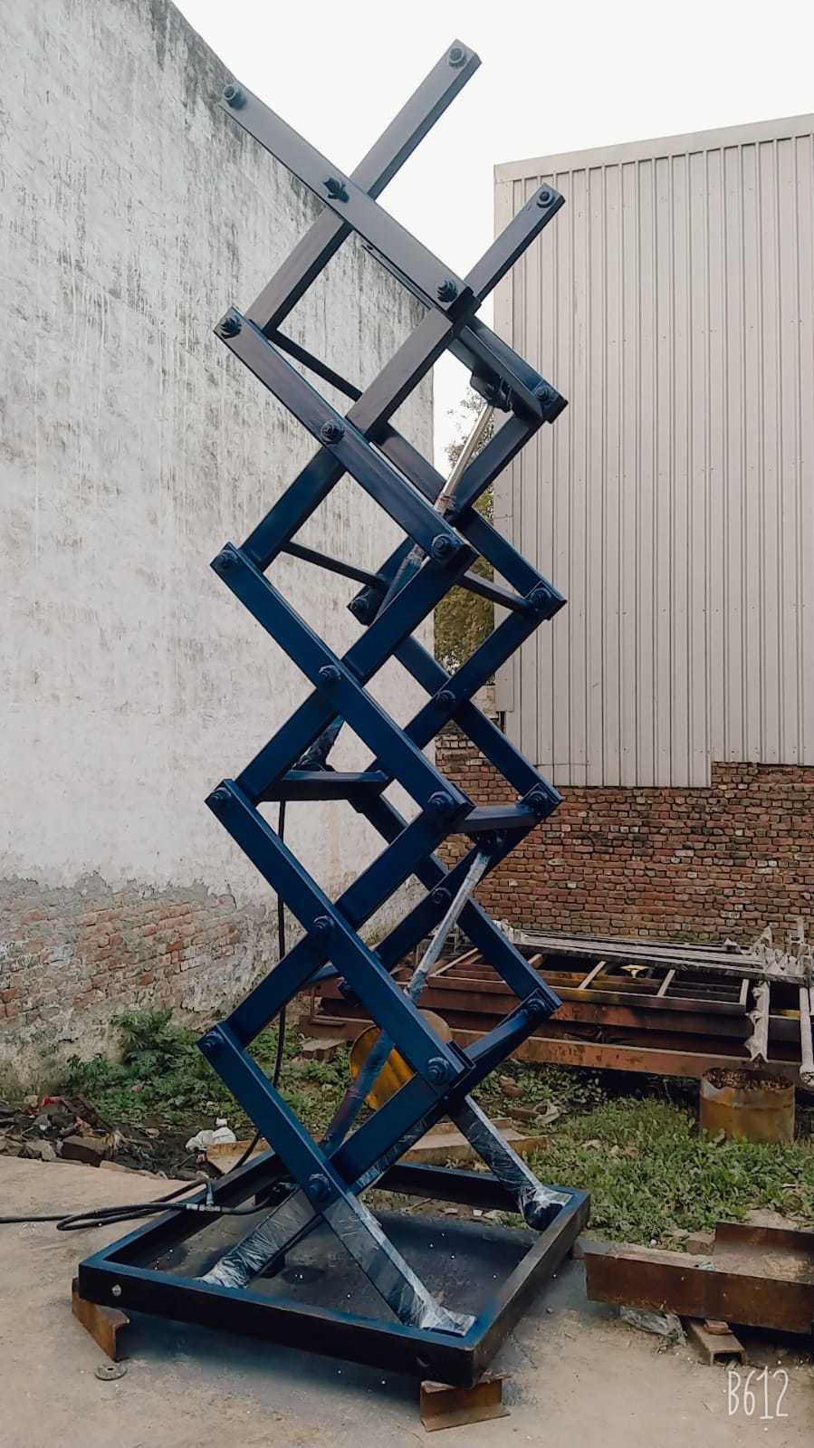 Hydraulic Scissor Lift - Mobile Electric Model, Different Sizes Available, Durable Yellow Design