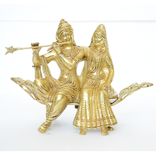 Metal Radha Krishna Sitting On A Throne