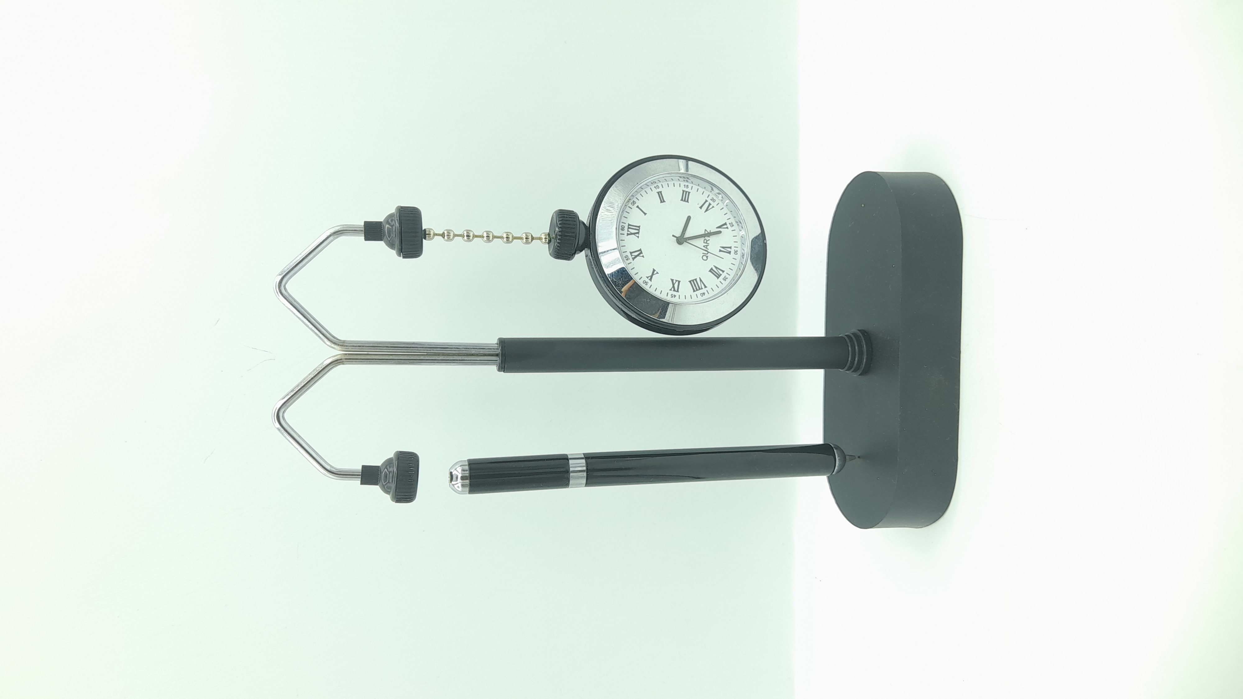 Magnetic Pen Holder With Analog Clock And A Balancing Pen