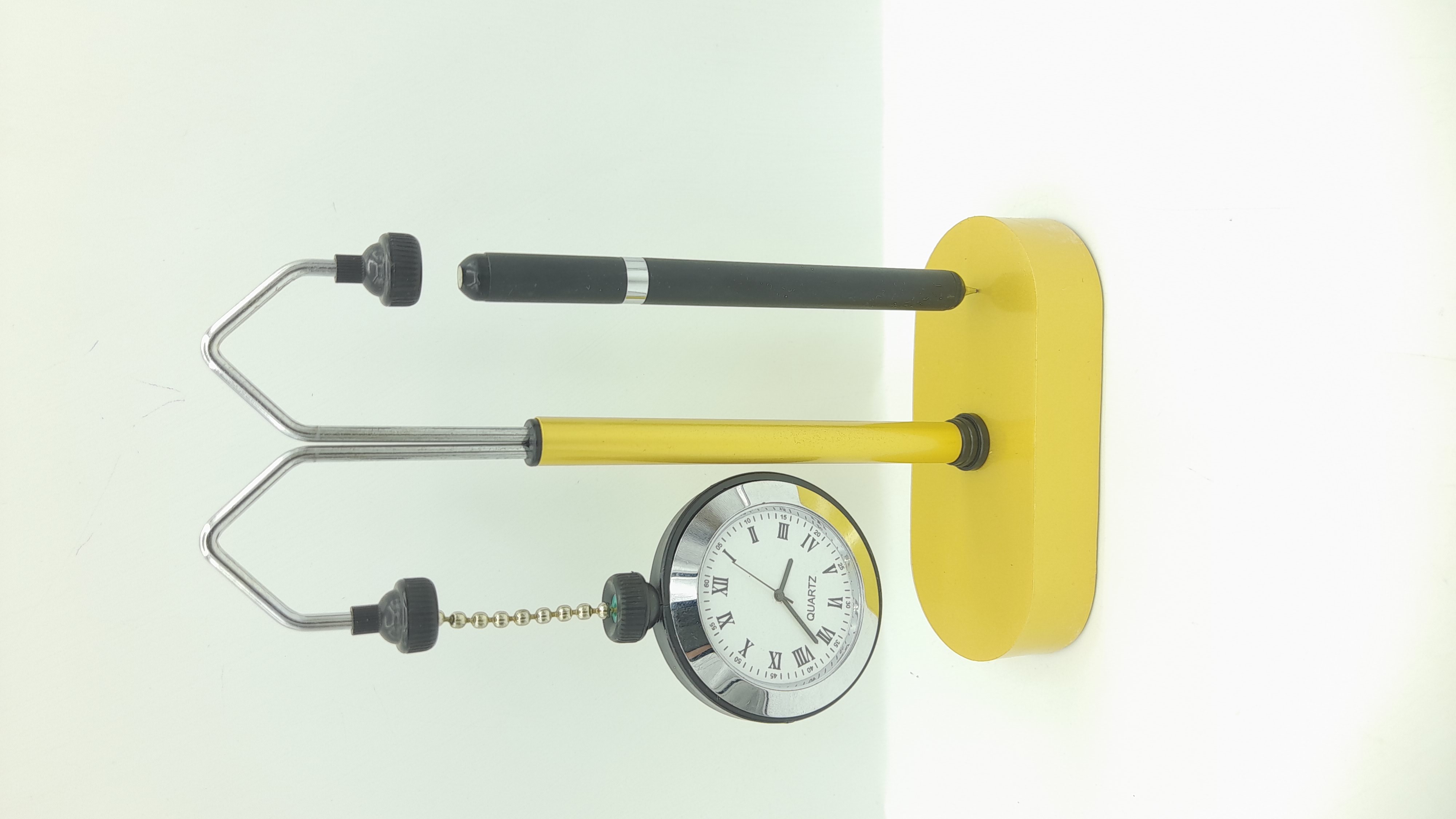 Magnetic Pen Holder With Analog Clock And A Balancing Pen