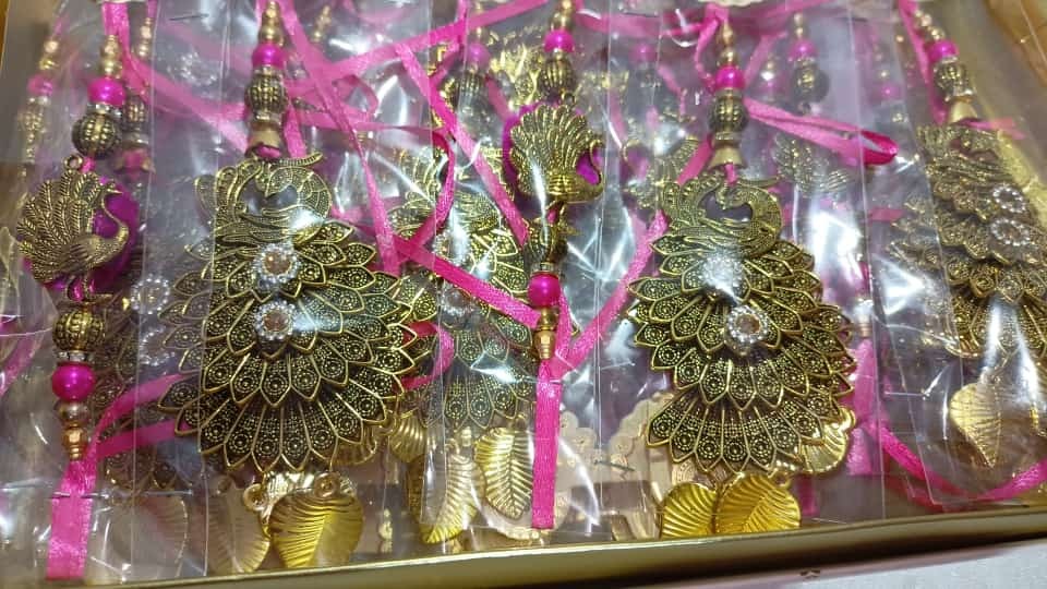 Gold And Pink Ethenic Bhaiya Bhabhi Rakhi Pair