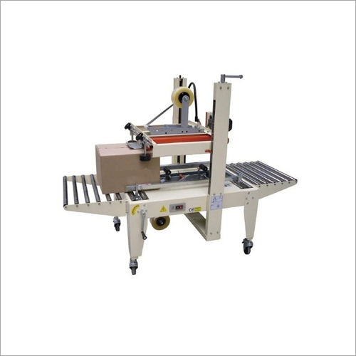 White Manual Based Cartoon Sealer Machine