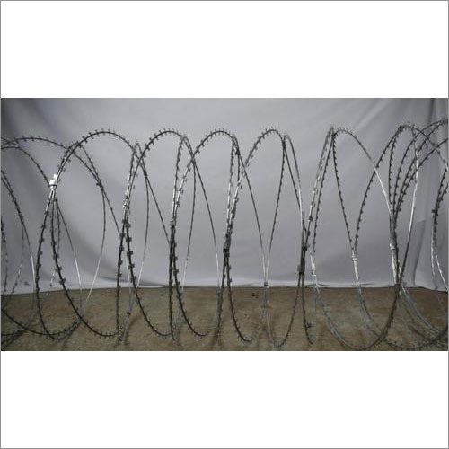 Concertina Coil - Galvanized Iron, Length 1.5-3m, Weight 10-50kg, Silver Color, 2.5mm Wire Diameter | Security Fencing, Customizable Dimensions, Circular Aperture, Coiled Mesh Style