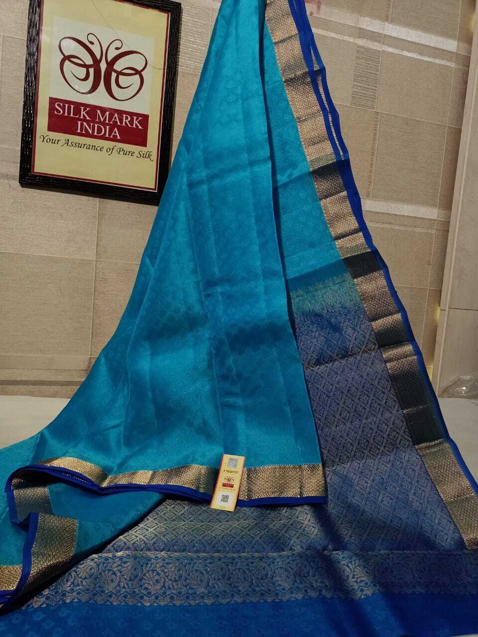 Kanjivaram Pure Silk Saree - One Warp Silk With All-over Emboss Pattern, Light Weight Rich Pallu And Contrast Blouse With Zari Work