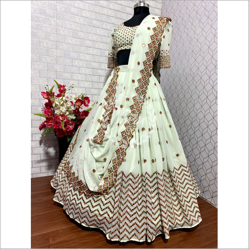 मॉडर्न लाइट पिस्ता हरे रंग की एम्ब्रॉयडरी पार्टी वियर लहंगा चोली Lc 99