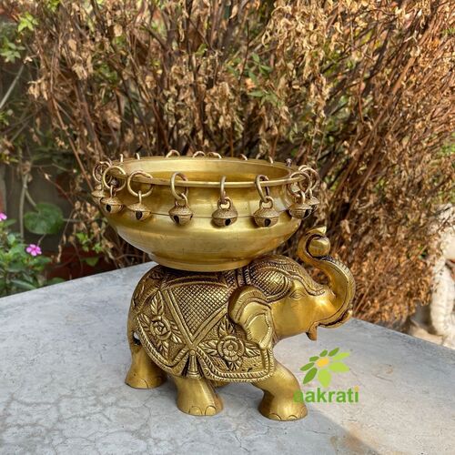 हुरली के साथ आक्रती एंटीक फ़िनिश वाली हाथी की मूर्ति मंदिर/घर की सजावट में बेहतरीन इजाफा