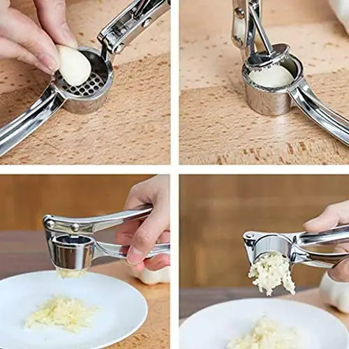 Silver Hand Held Garlic Crusher