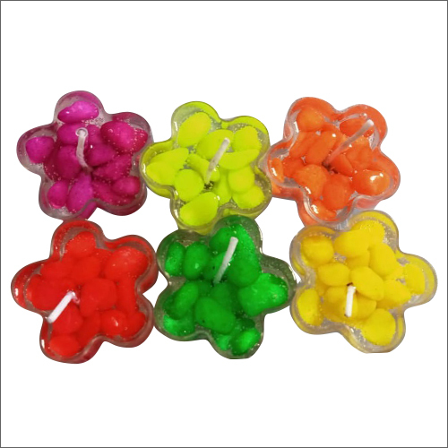 विभिन्न रंगों में स्टार शेप कैंडल्स उपलब्ध हैं