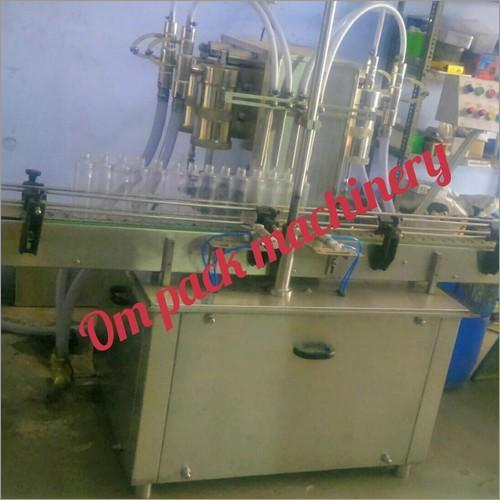 Automatic 4 Head Liquid Filling Machine