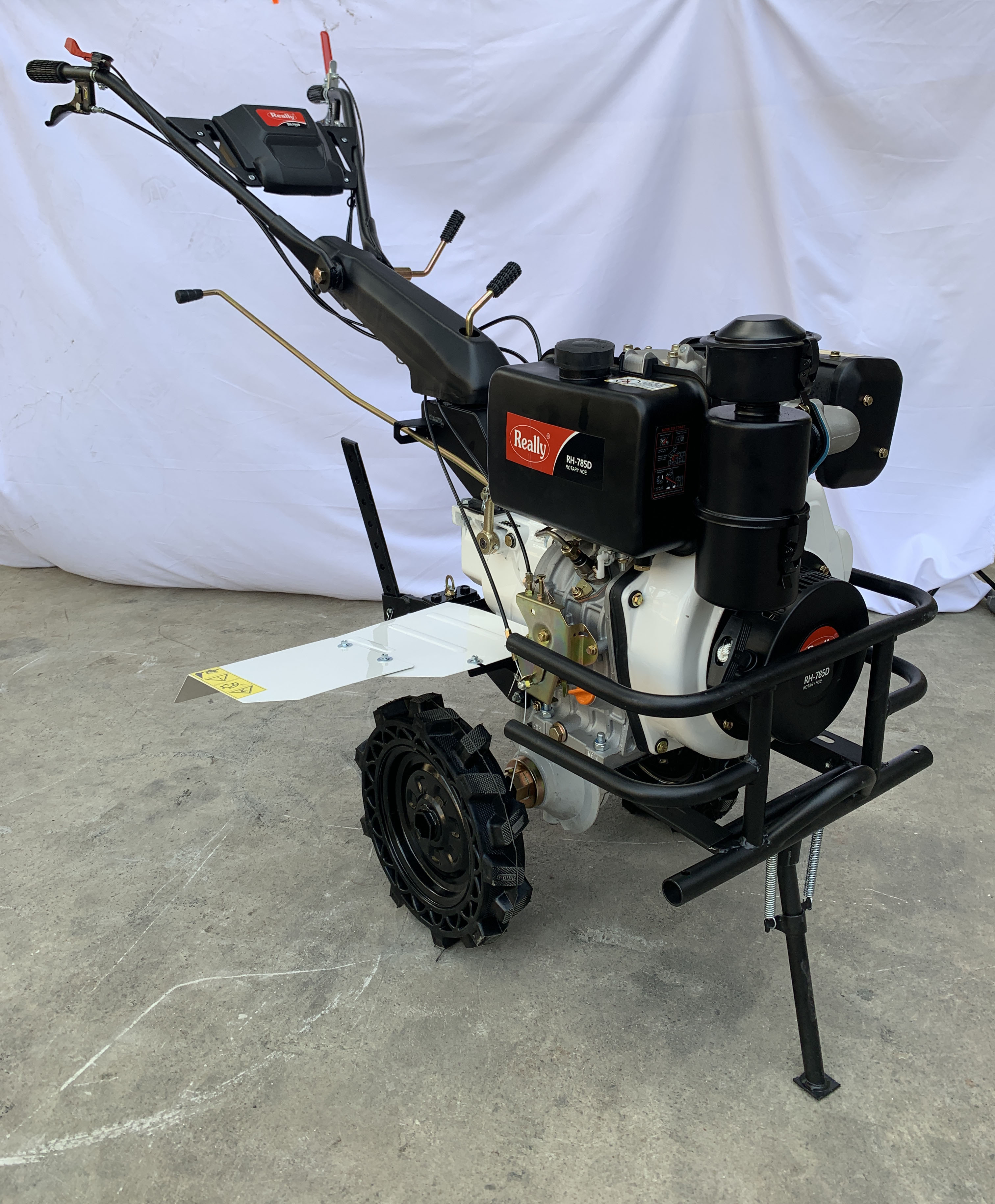 Really 785d Diesel Power Weeder - Mild Steel, 49 Acre/hr Capacity, 167 Ltr Engine Oil Capacity, 4.00*8 Tubeless Tyres, 5.5 Kw Power Output, Diesel & Petrol Power Source, Heavy Duty Design - High Fuel Efficiency, Multi-application Capability