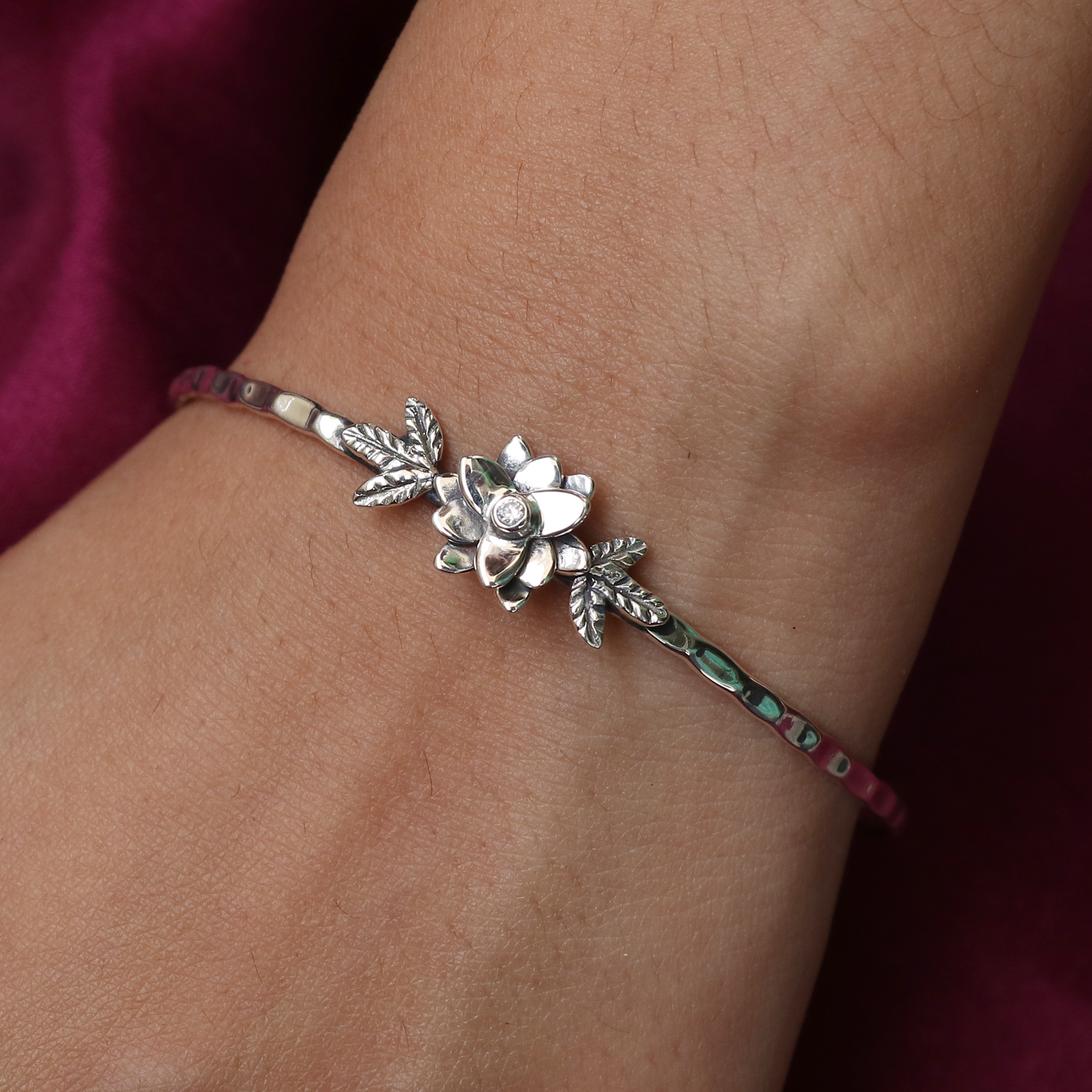 Flower And Leaf Cubic Zirconia Cut Round Shaped Stone