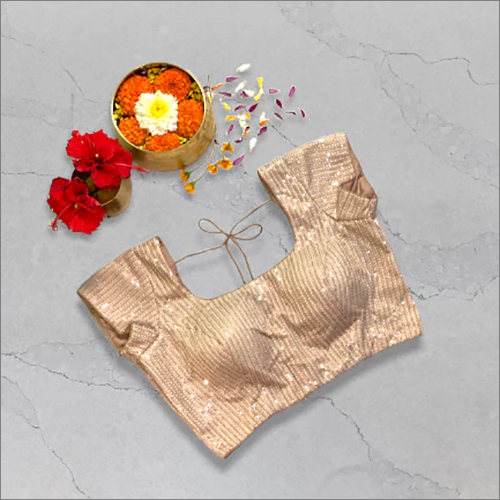 एम्ब्रॉयडरी किया हुआ लाइट पीच हाफ स्लीव ब्लाउज