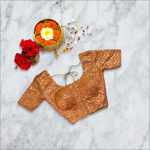 एम्ब्रॉयडरी किया हुआ टेंजेरीन कलर हाफ स्लीव ब्लाउज