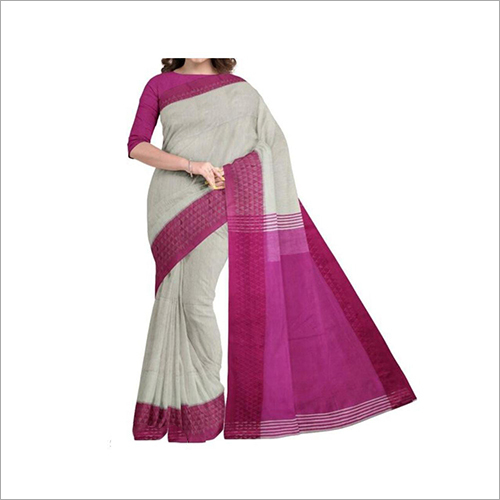 सफेद और बैंगनी रंग की बुनी हुई कॉटन साड़ी