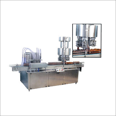 Automatic Bottle Filling & Capping Machine (Monobl