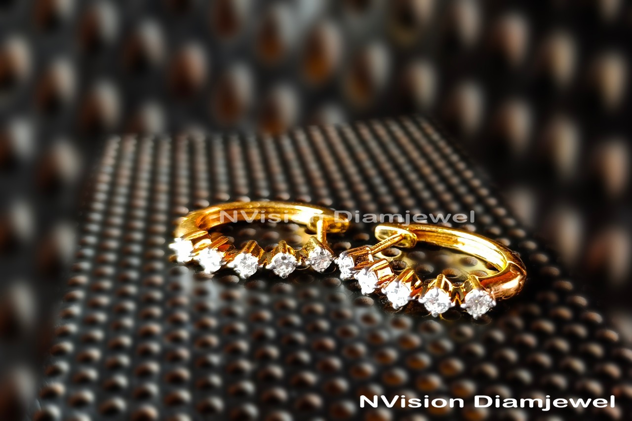 Diamond Earring Diamond Carat Weight: 0.59 Carat
