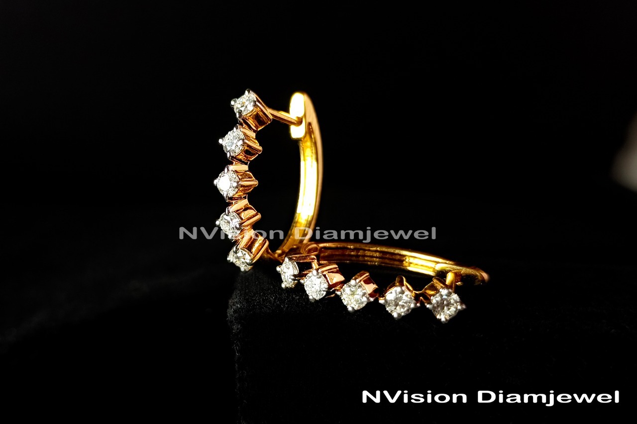 Diamond Earring Diamond Carat Weight: 0.59 Carat