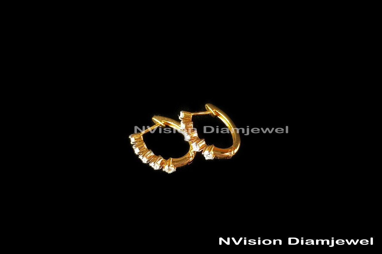 Diamond Earring Diamond Carat Weight: 0.59 Carat