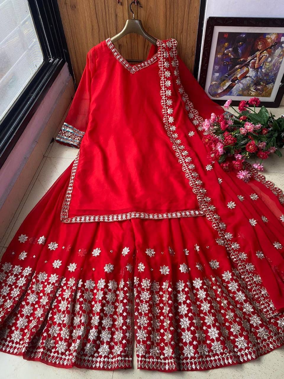 Georgette Top With Beautiful Embroidered Palazzo And Suits...