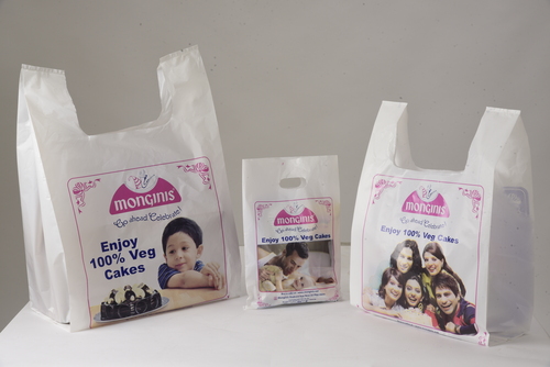 व्हाइट प्रिंटेड डी कट बैग्स