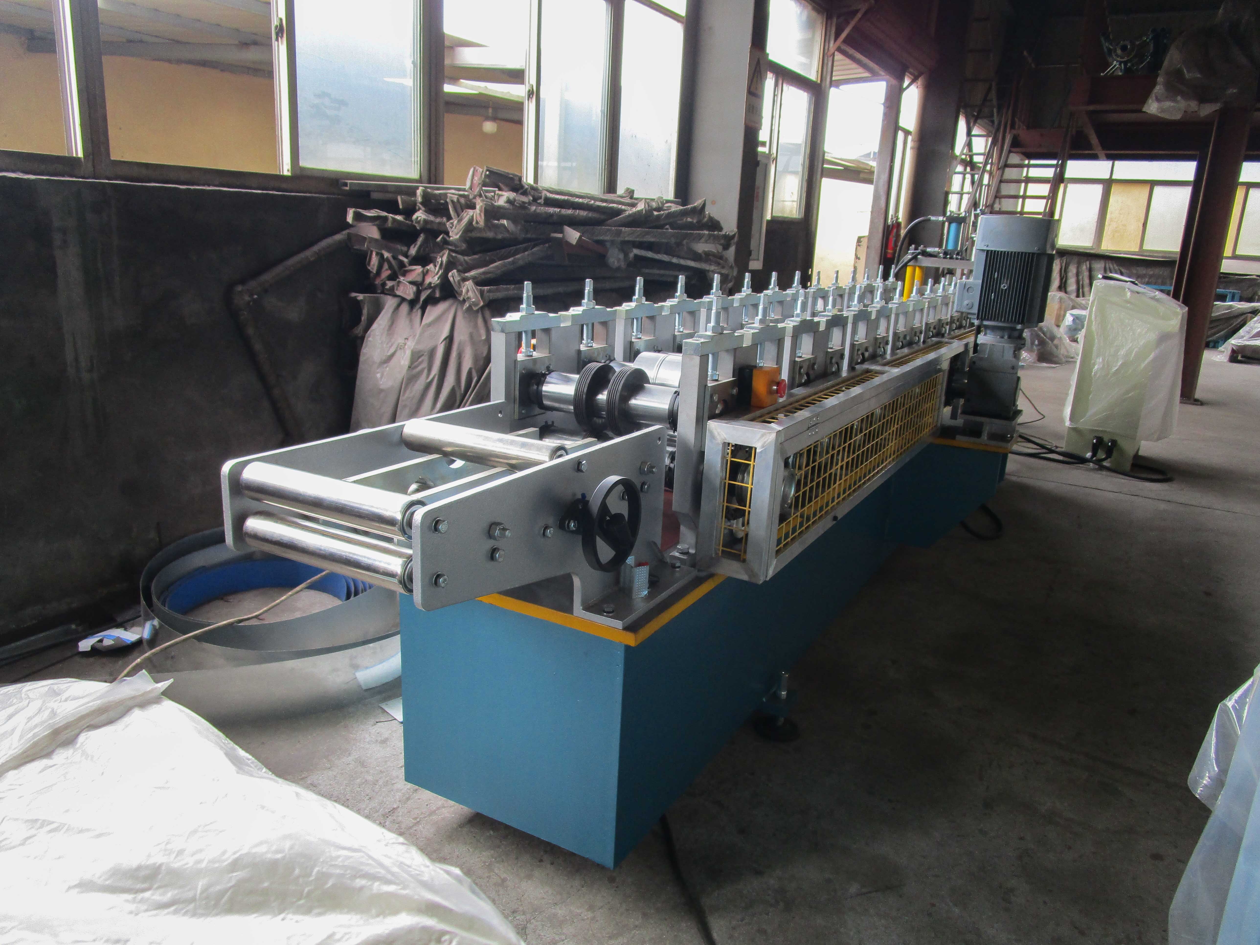 C U Stud & Track Roll Forming Machine - Steel Coil Sheet Material, 4.8x1.1x1.6 M Dimensions, Blue Color, 5.5 Kw Main Motor Power, 15 Forming Stations, Length-set Hydraulic Cutting System, 3-year Warranty