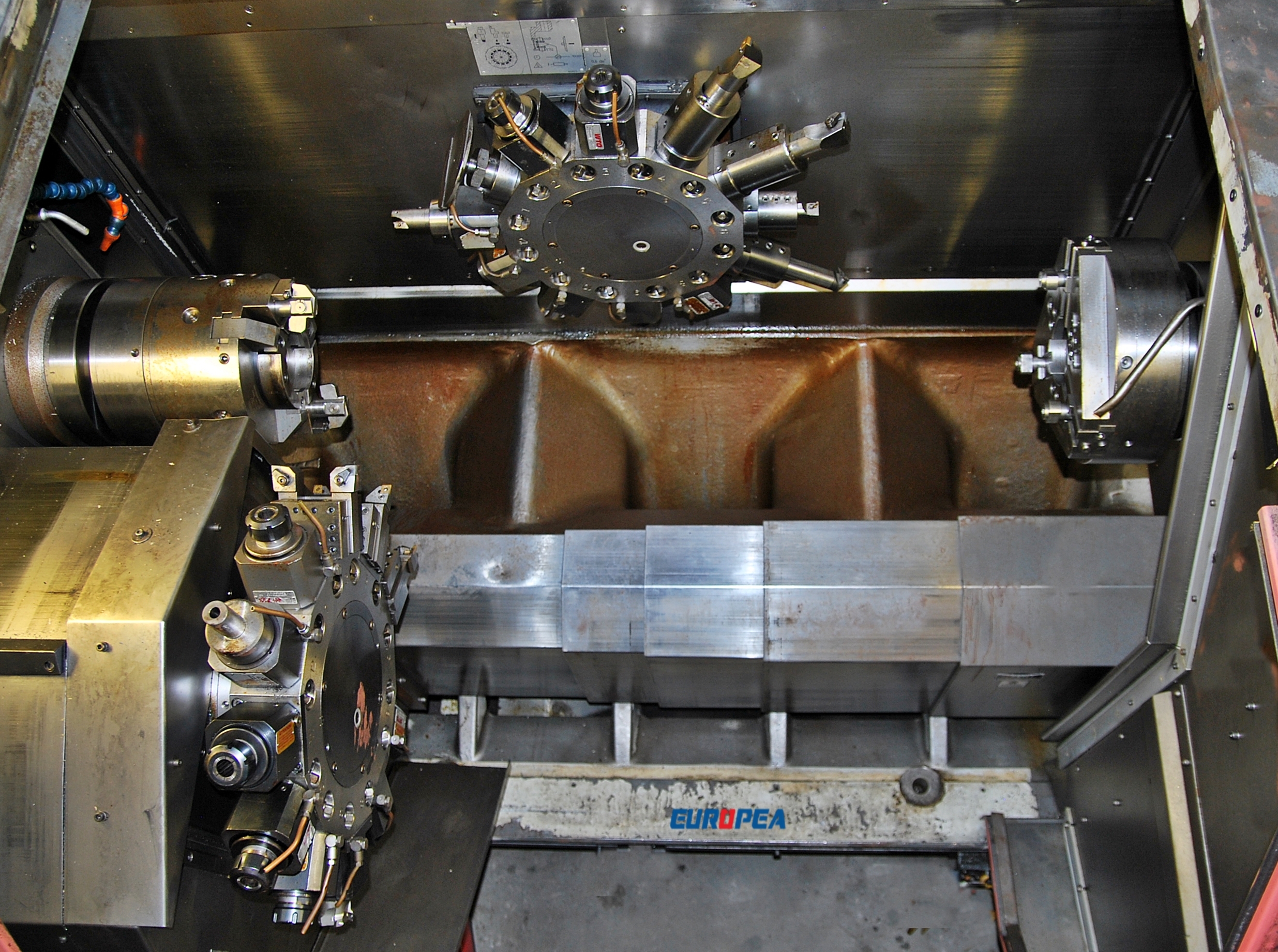 Gildemeister Mf Twin 300 Used Imported Turn Mill Center - 33.5 Hp Main Spindle 4000 Rpm Speed 42.5 In Z-axis Travel 12 Tools Per Turret Includes Chip Conveyor & Tool Holders