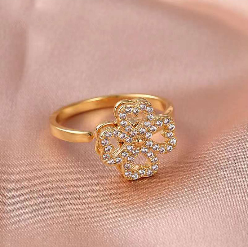 Rotating Cubic Zirconia Studded Adjustable Gold-plated Clover Ring - Stainless Steel, Adjustable Size | Fidget Spinner Design For Anxiety Relief And Meditation