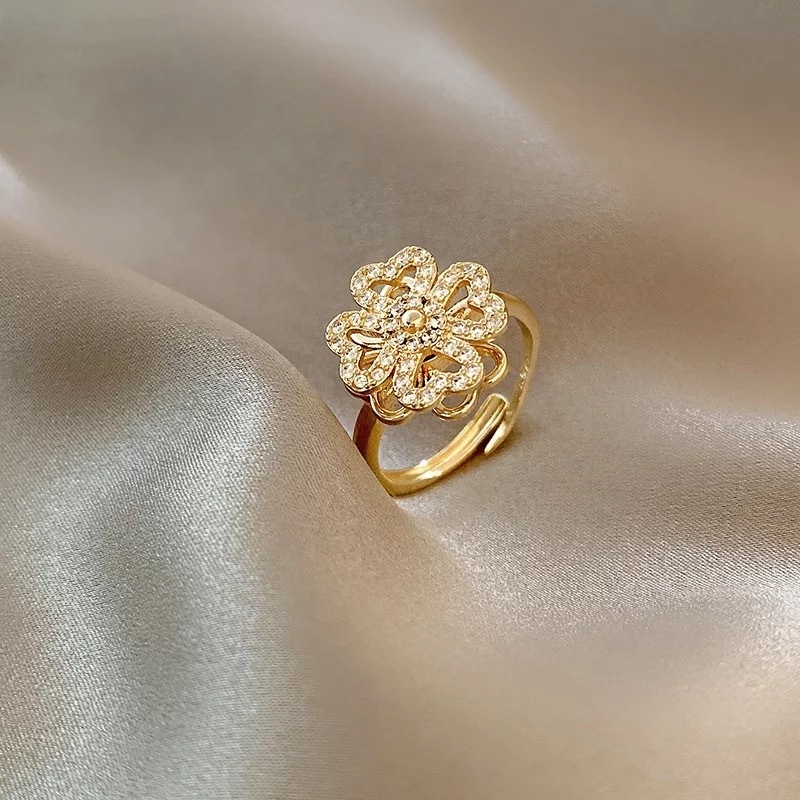 Rotating Cubic Zirconia Studded Adjustable Gold-plated Clover Ring - Stainless Steel, Adjustable Size | Fidget Spinner Design For Anxiety Relief And Meditation
