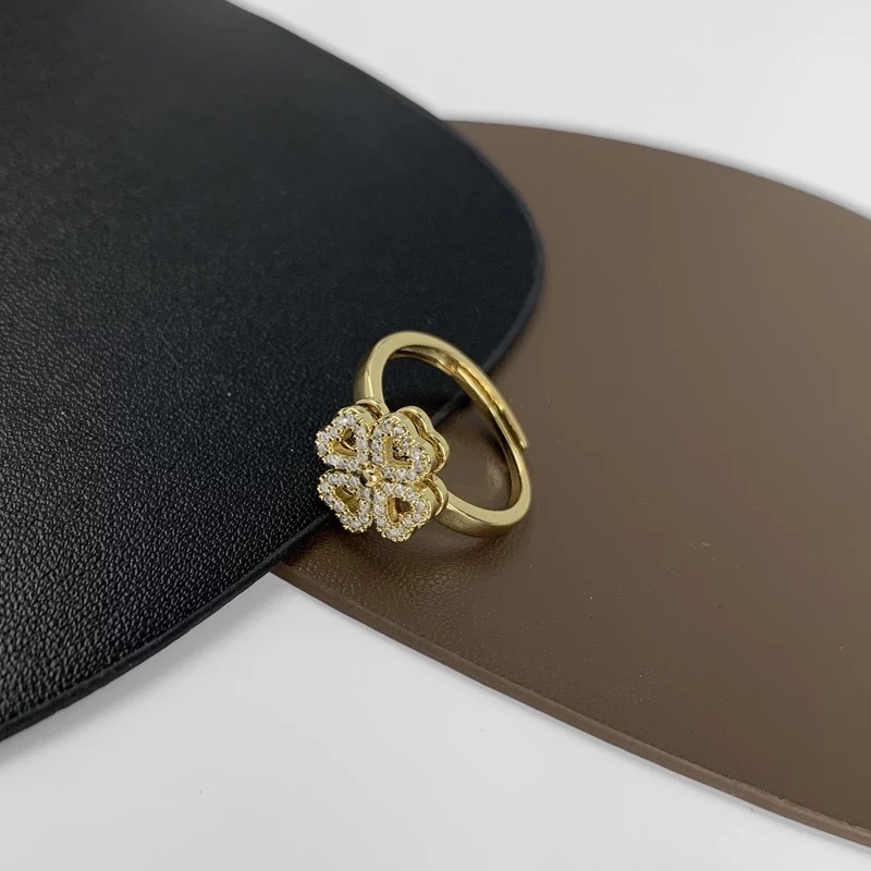 Rotating Cubic Zirconia Studded Adjustable Gold-plated Clover Ring - Stainless Steel, Adjustable Size | Fidget Spinner Design For Anxiety Relief And Meditation