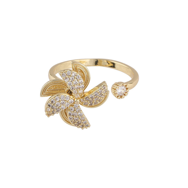 Rotating Cubic Zirconia Studded Adjustable Gold-plated Spinner Ring Gender: Women