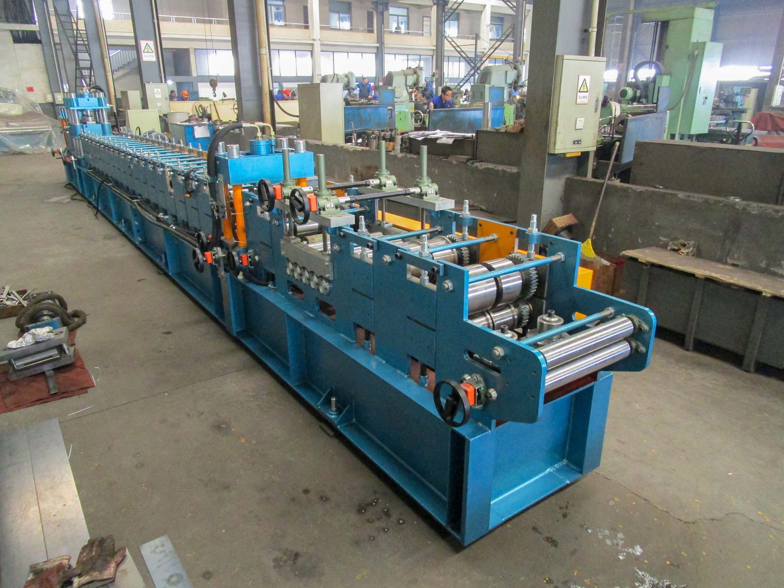 Drain Channel Roll Forming Machine - No.45 Steel, 11.5x1.1x1.7 M, Blue, 5.5 Kw Hydraulic Power, Automatic Length Cutting & Punching, Capacity 20 M/min, 24 Month Warranty